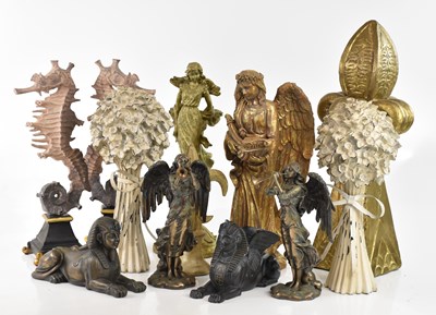 Lot 275 - A collection of decorative figures and models...