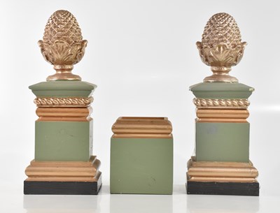 Lot 289 - A pair of green and gilt painted columns with...