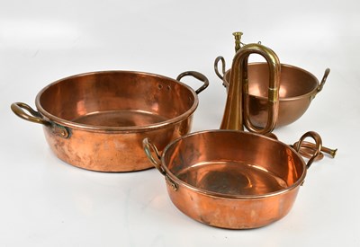 Lot 1334 - Two 19th century copper twin handled pans, a...