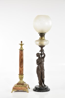 Lot 384 - An early 20th century bronzed figural oil lamp,...