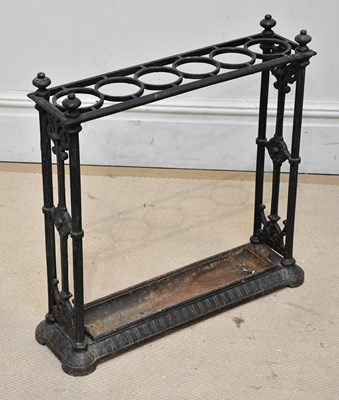 Lot 1335 - A cast iron six division stick stand of...