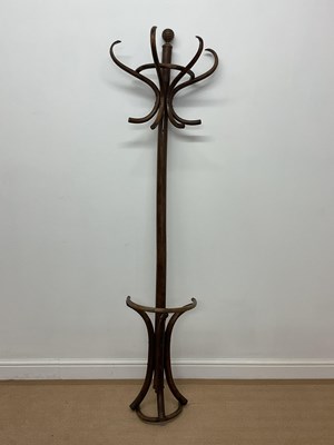 Lot 825 - A wall mounted bentwood coat stand, height 190cm.