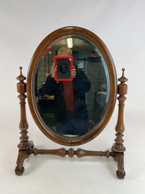 Lot 803 - A 19th century mahogany oval dressing table...