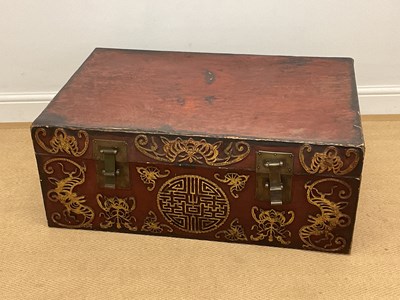 Lot 782 - An Oriental leather travel trunk with brass...