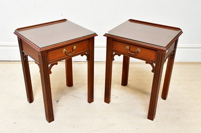 Lot 26 - A pair of reproduction lamp tables with single...