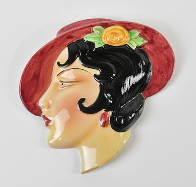 Lot 425 - COPE & CO; an Art Deco style wall mask...